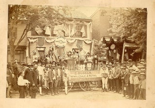 Item #29001745 Photograph of Group of Men in Costume, Surrounding the Parade Wagon of E. A....