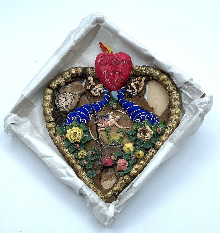 Item #8015656 Victorian Cookie - with Cupid & Cornucopias of Flowers in a Garden Scene plus Marzipan Flaming Heart